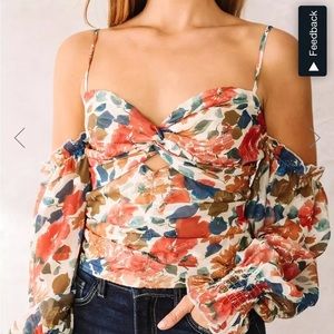 A Peach From Buckle Lg Floral Off the Shoulder Top with Straps and Front Cut Out